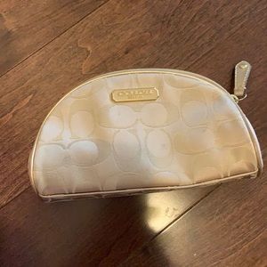 Coach small beige makeup bag
